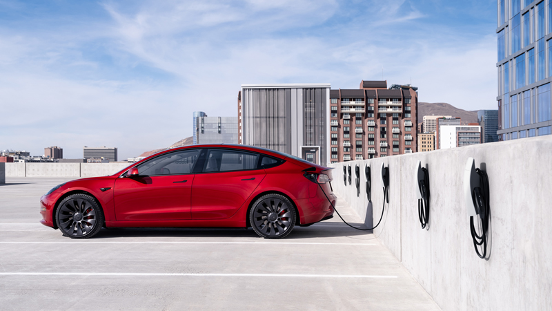 electric car plugged in and charging in California