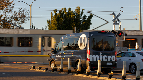 Metro Micro van at grade crossing